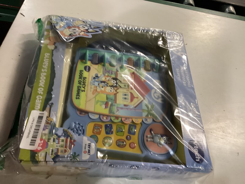 Condition photo showing New/Like New for vtech bluey bluey's book of games