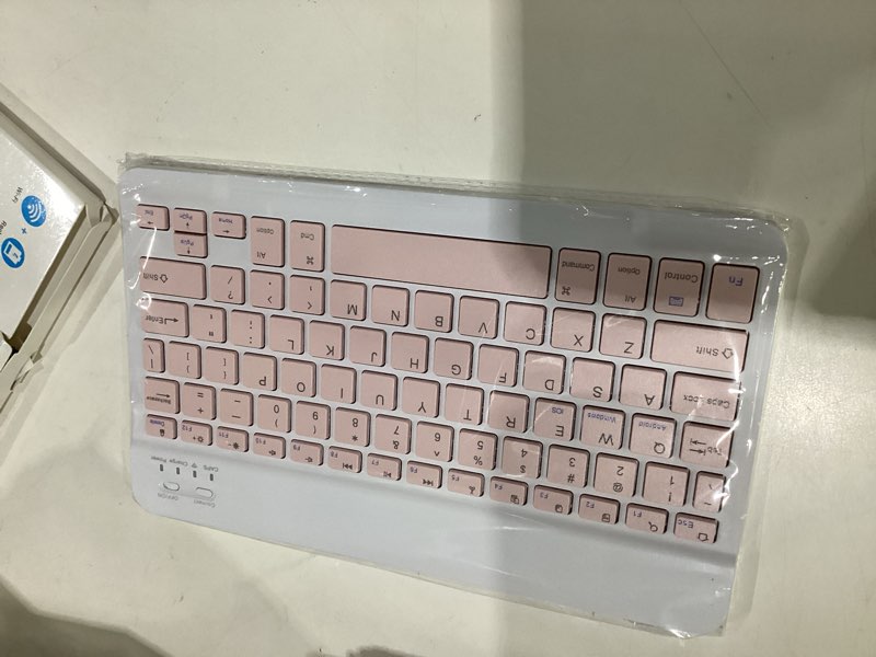 Condition photo showing Good Condition for ultra-slim bluetooth keyboard portable mini wireless keyboard rechargeable for apple ipad iphone samsung tablet phone smartphone ipados ios android (10 inch pink), not tested