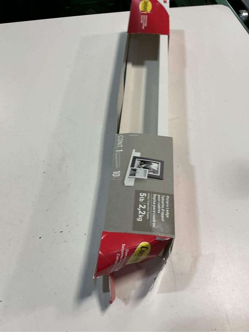 Condition photo showing Good Condition for Command Picture Ledge, 21" Damage Free Hanging Floating Shelf with Adhesive Strips, Quartz, No Tools Picture Hanger for Displaying Decorations and Photographs, 1 Ledge and 10 Strips