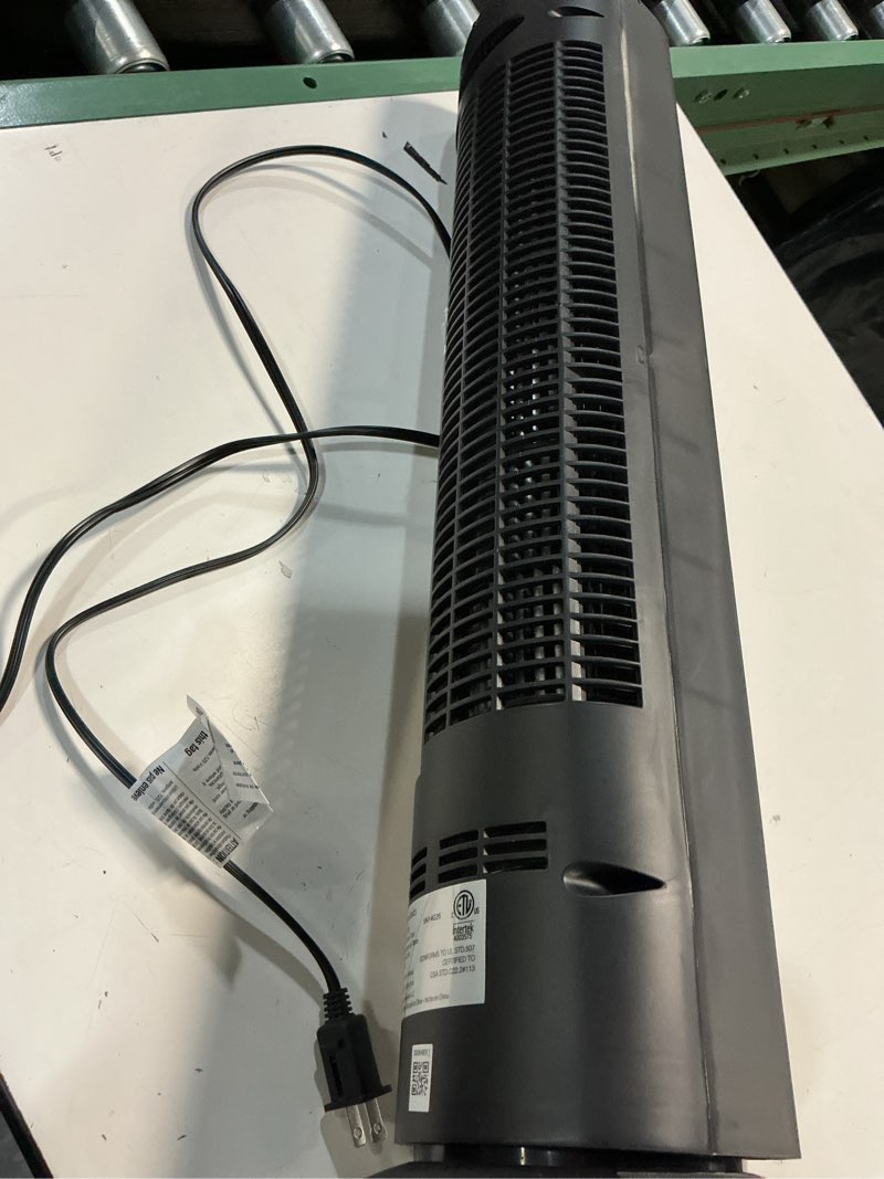 Condition photo showing As Is for amazon basics 28" 60-degree oscillating tower fan with powerful airflow for bedroom, living room, office, 3 speeds, mechanical control, air circulator, 35w, 27.8"h x 9.4"d x 9.4"w, black 28" - mechanical control