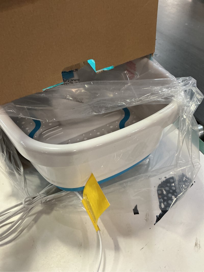 Condition photo showing Good Condition for homedics bubble bliss deluxe foot spa with heat massaging arch, 3 acupressure attachments, splash guard, raised nodes creates bubbles, improves circulation, soothe tired muscles standard blue