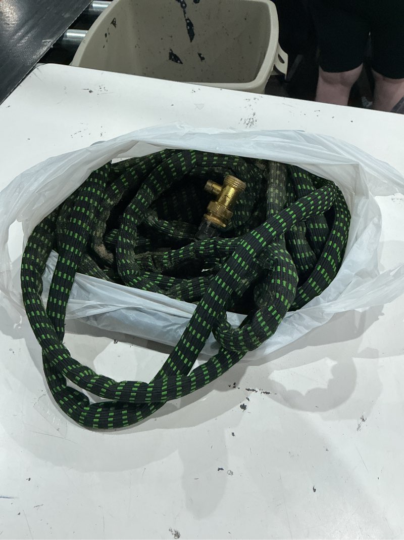 Condition photo showing As Is for flex-able hose xtreme 1-in x 100-ft kink free woven green hose