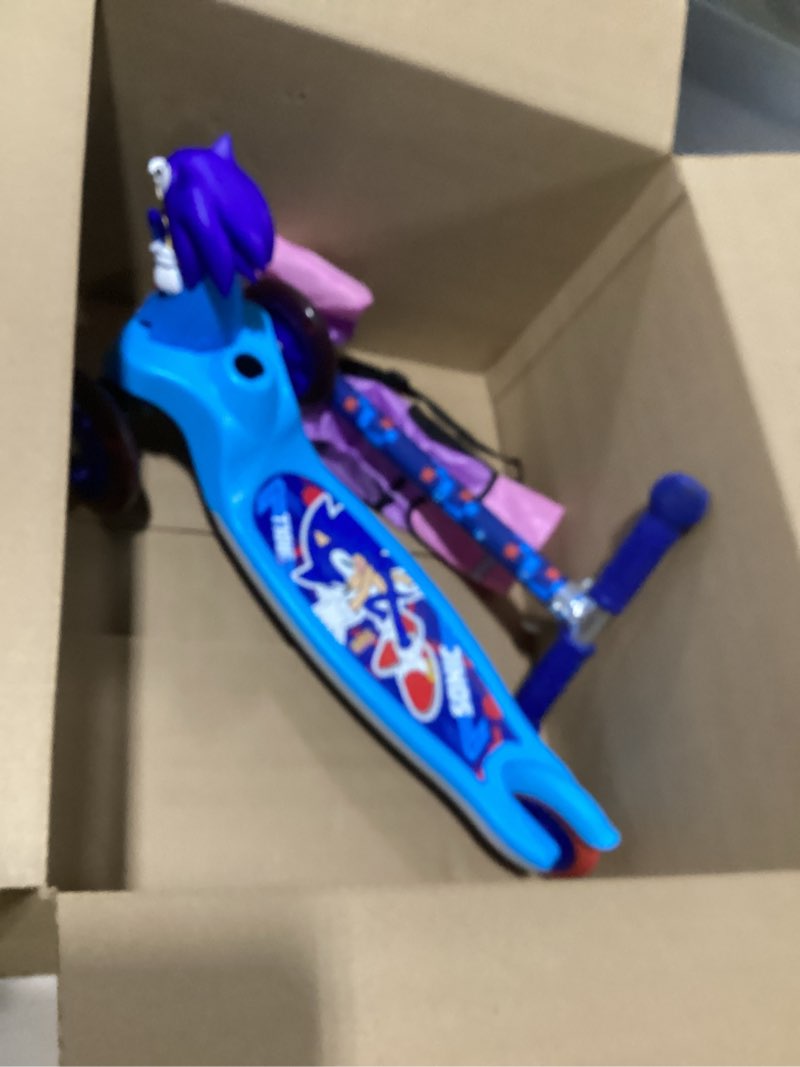 Condition photo showing As Is for voyager - self-balancing toddler kick scooter, 3-wheel scooter with light-up wheels, extra wide deck, foot brake, lean-to-steer design, 75 lb limit, ages 3+ sonic the hedgehog