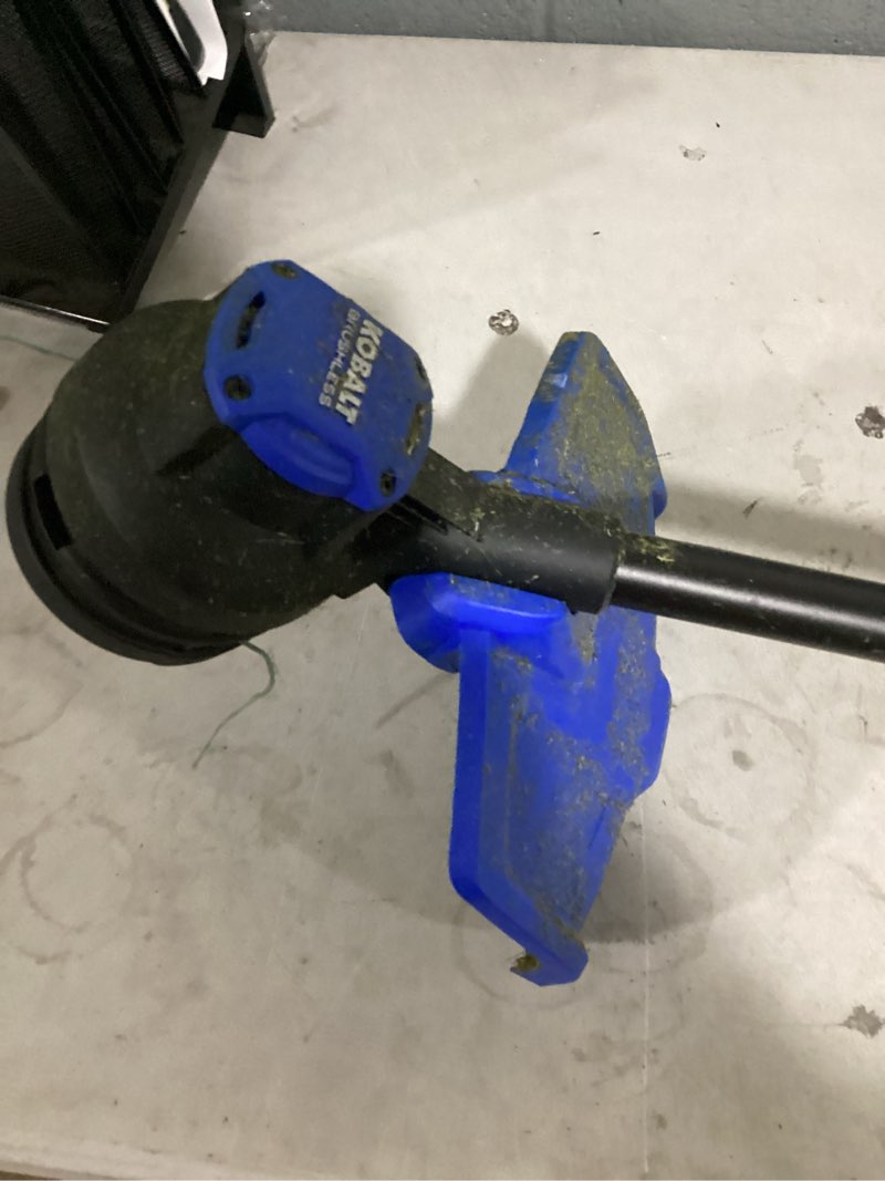 Condition photo showing As Is for kobalt 24-volt 12-in straight shaft battery string trimmer battery and charger not included