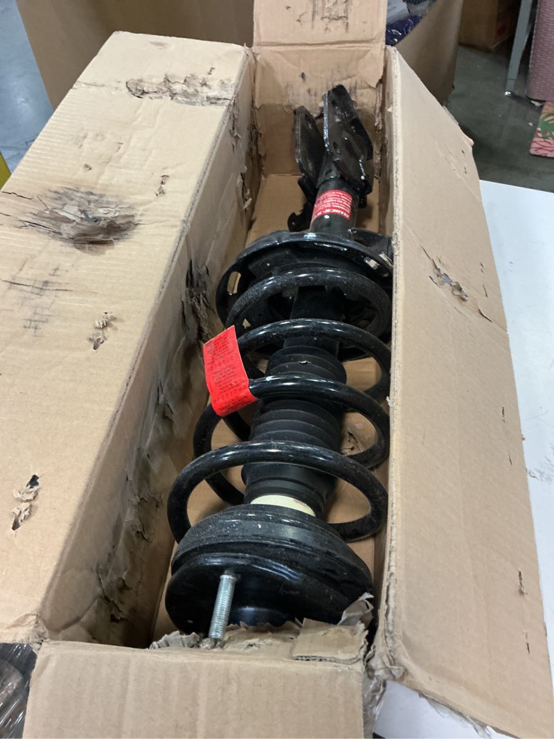 Condition photo showing As Is for Monroe Shocks & Struts Quick-Strut 572527 Strut and Coil Spring Assembly