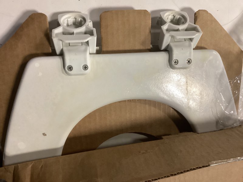 Condition photo showing As Is for bemis round enameled wood toilet seat in cotton white with easy•clean hinge