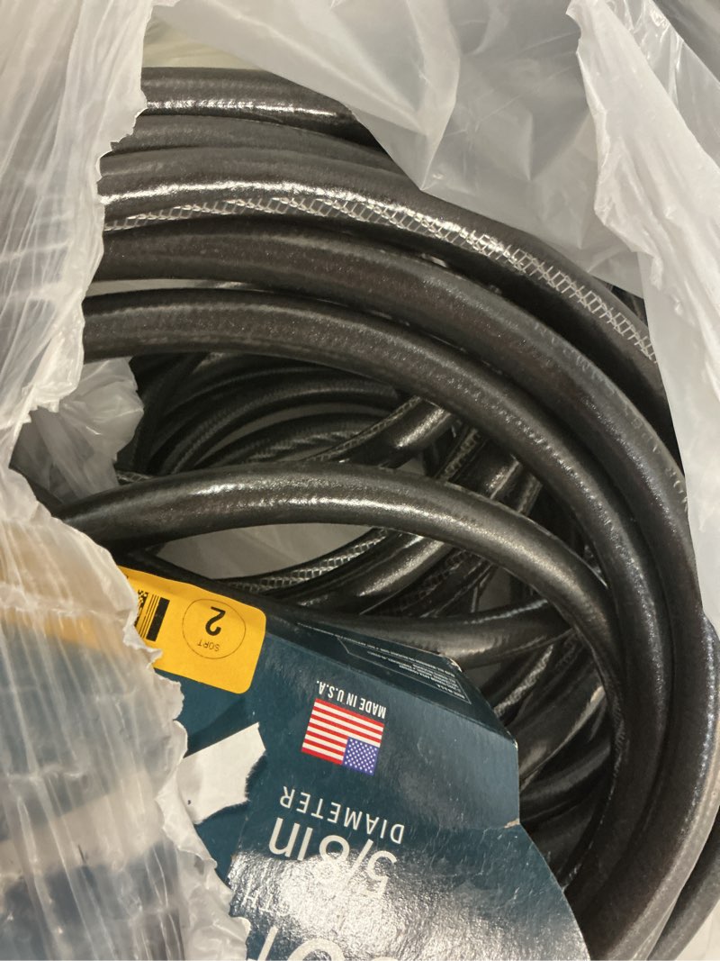 Condition photo showing As Is for neverkink teknor apex 5/8-in x 100-ft heavy-duty kink free vinyl gray coiled hose