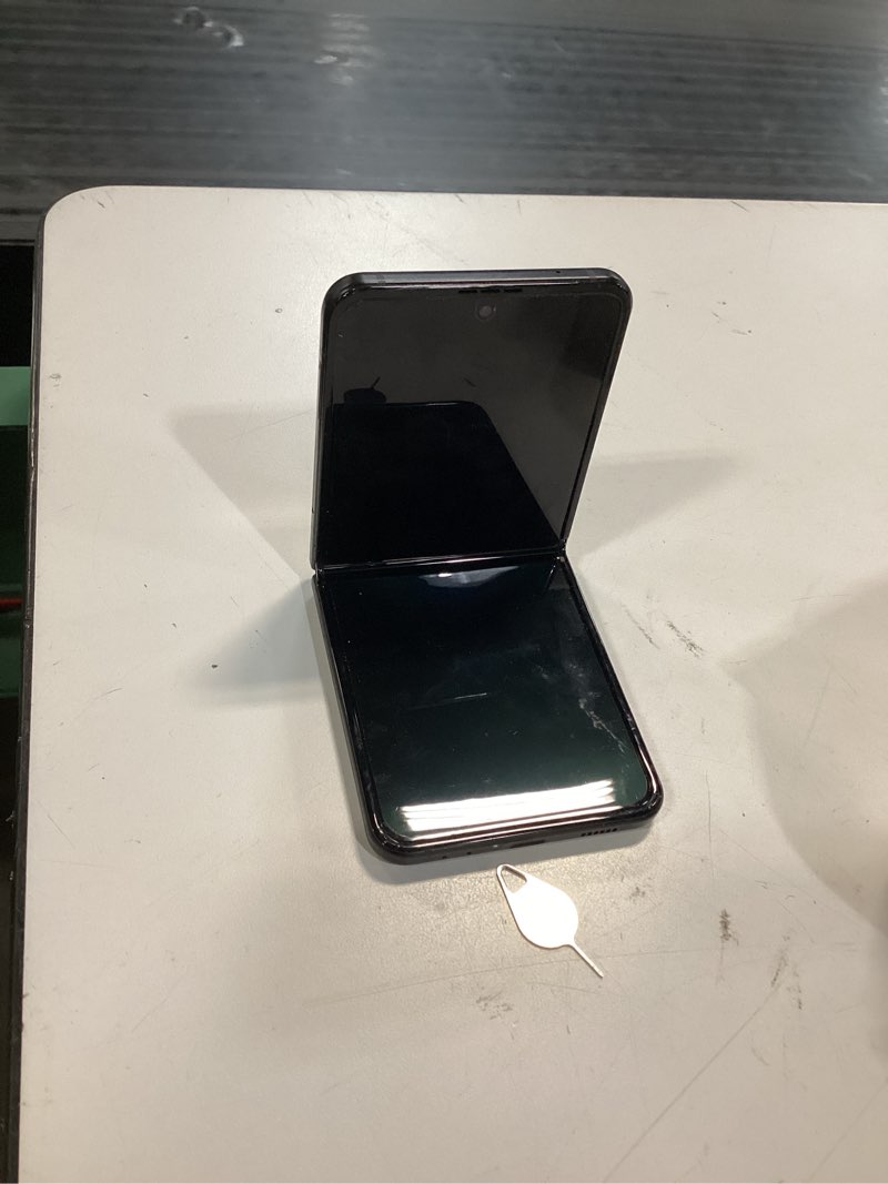 Condition photo showing Good Condition for samsung galaxy z flip 3 5g, us version, 128gb, phantom black - unlocked (renewed). ***working condition verified. no network or connectivity tests were performed. bidder be advised ***