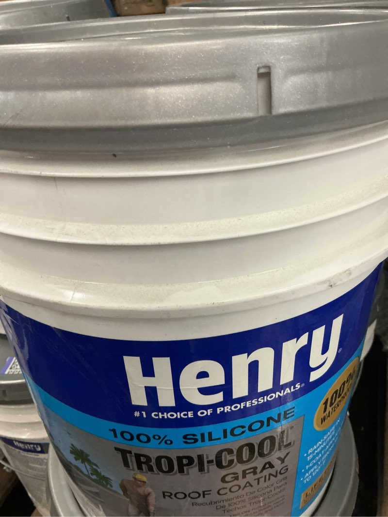 Condition photo showing As Is for henry 887g tropi-cool gray 100% silicone reflective roof coating 4.75 gal.
