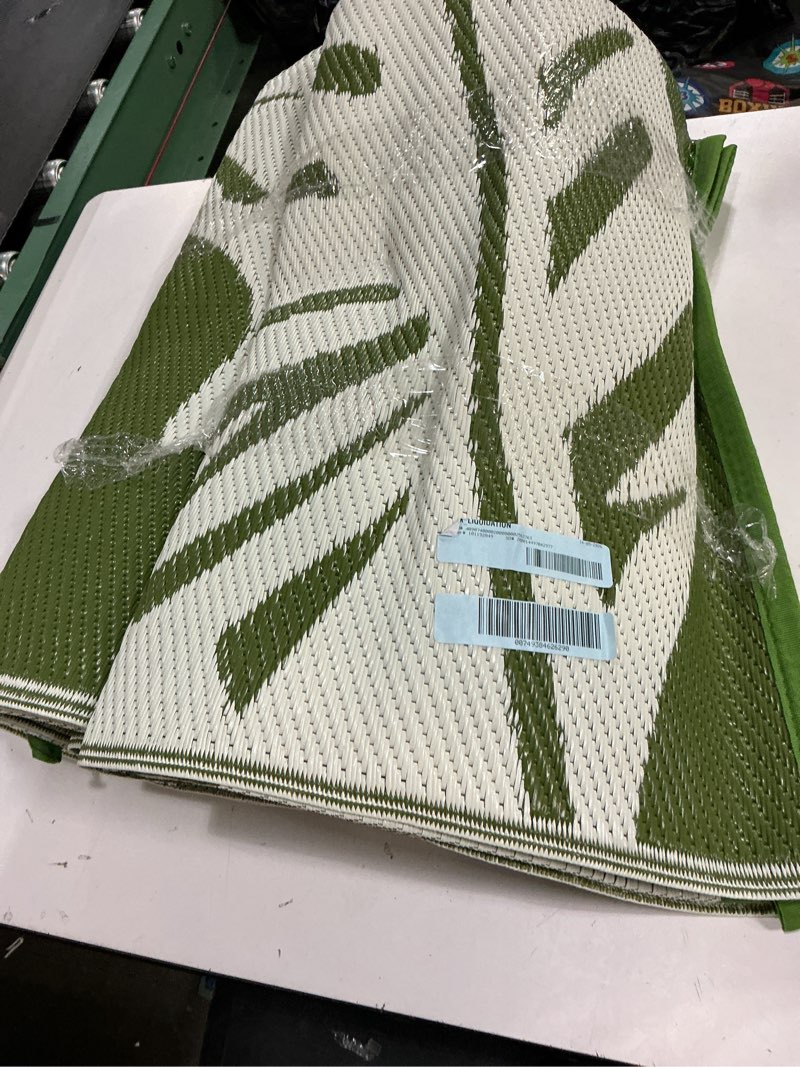 Condition photo showing Good Condition for vunate outdoor rug carpet 5'x8' waterproof reversible patio rug portable indoor outdoor rug plastic straw rug for beach rv camping garden picnic deck backyard tropical porch decor green