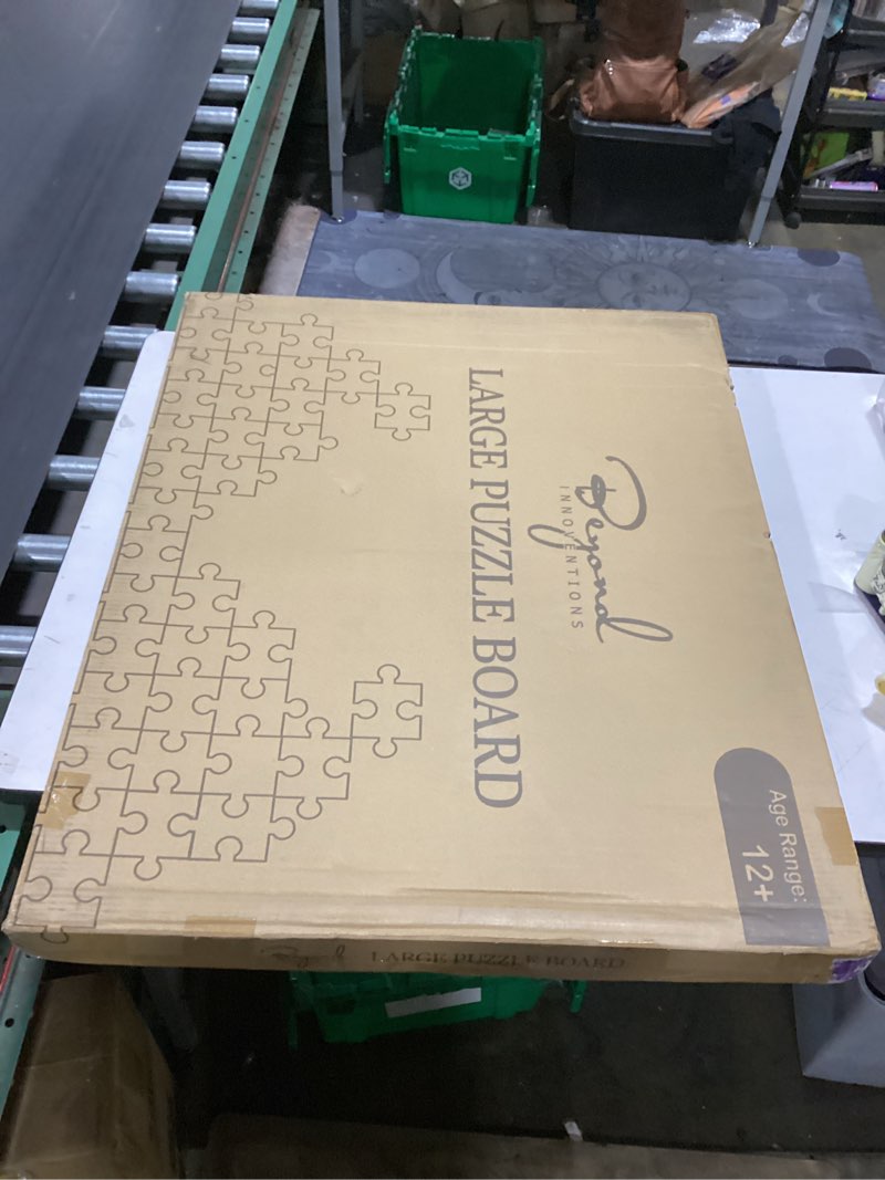Condition photo showing New/Like New for 1500 piece wooden jigsaw puzzle board - 6 drawers, preassembled rotating puzzle table | 35” x 28” jigsaw puzzle board | puzzle cover included - portable tables for adults and kids