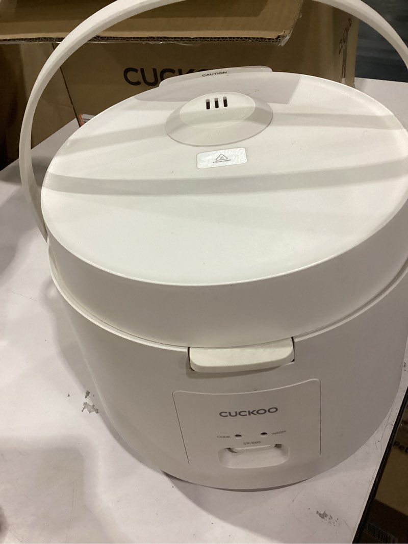 Condition photo showing As Is for *used,not tested*cuckoo basic rice cooker 10-cup uncooked / 20-cup cooked, large rice maker and warmer with nonstick inner pot, easy to use with auto keep warm, includes steam tray, white (cr-1095)