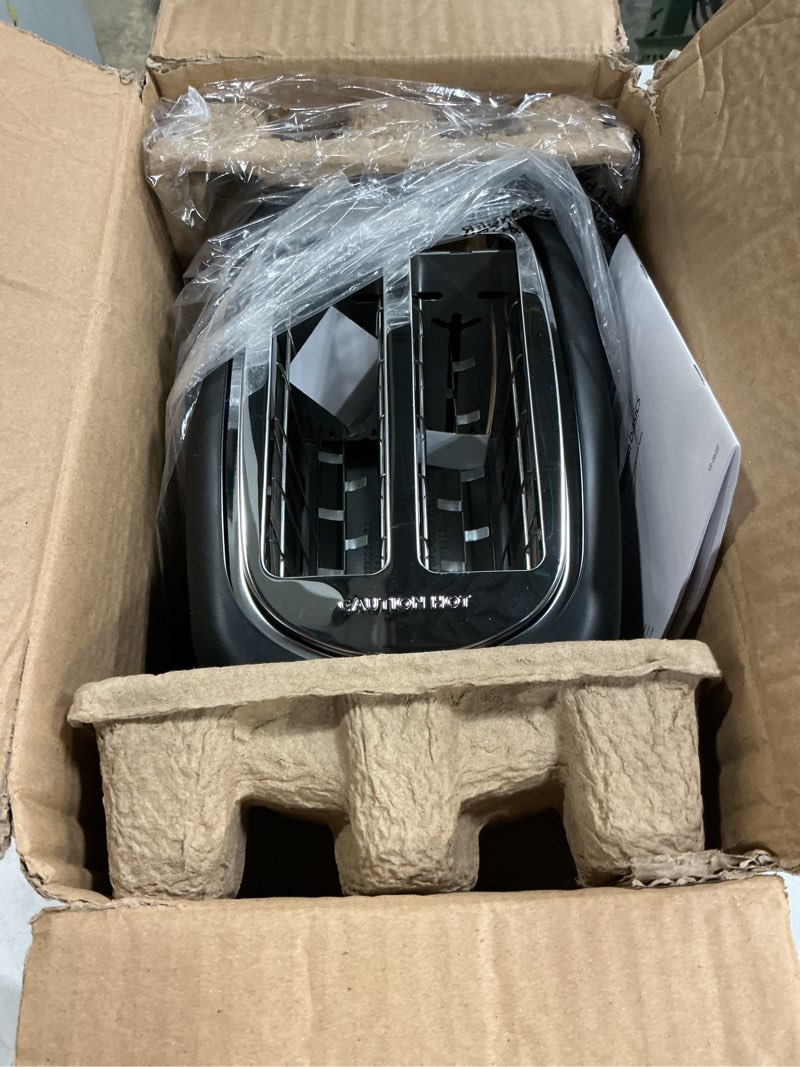 Condition photo showing Good Condition for amazon basics 2 slice toaster, extra wide slots for bagels, 6 browning settings, removable crumb tray, defrost/cancel/bagel buttons, cord wrap, 900w, black & silver 2 slice silver front