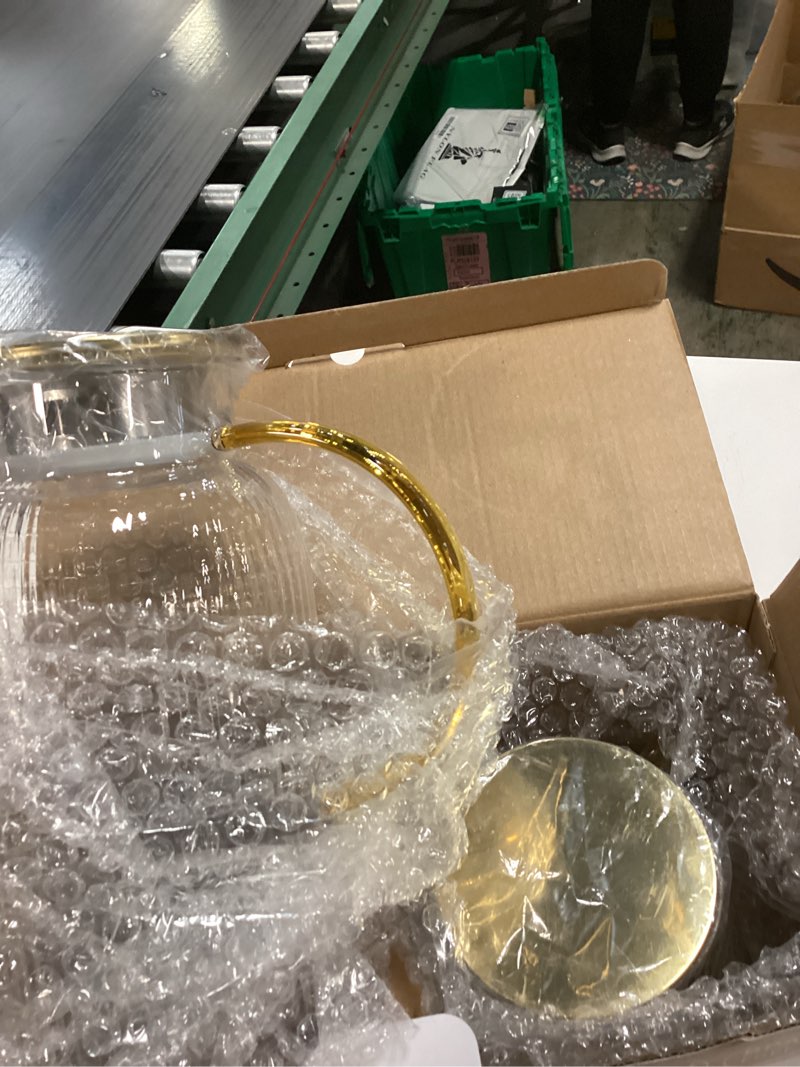 Condition photo showing As Is for 2 PACK Glass Pitcher with Lid 64 oz, Classic Vertical Stripes Pitcher with Lid and Handle, Water Jug for Hot/Cold Drinks, Borosilicate Glass Carafe for Coffee, Iced Sun Tea, Juice, Sangria 64 Ounces-2 Pack