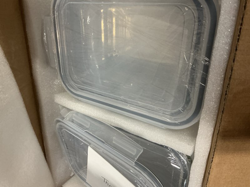 Condition photo showing New/Like New for 4 Pack 8 Cups/ 63oz Large Glass Storage Containers with Lids, Meal Prep Containers, Glass Food Storage with Airtight Lid for Baking, Leak Proof & Microwave, Oven Safe (4 Containers + 4 Lids)