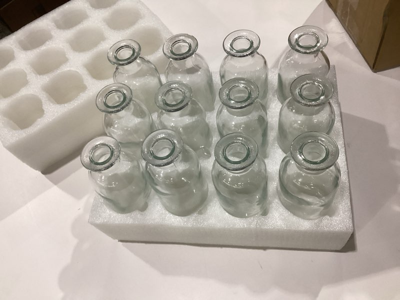 Condition photo showing New/Like New for Peohud Set of 12 Glass Bud Vases, Clear Small Flower Vases, Decorative Glass Bottles Floral Vases for Home Decor, Wedding Reception, Party