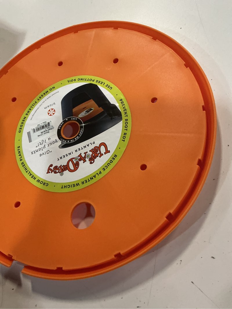 Condition photo showing Good Condition for bloem ups-a-daisy round planter insert: 13" - orange - durable resin disk, drainage holes, place inside a planter, use less potting soil, for indoor & outdoor use, gardening