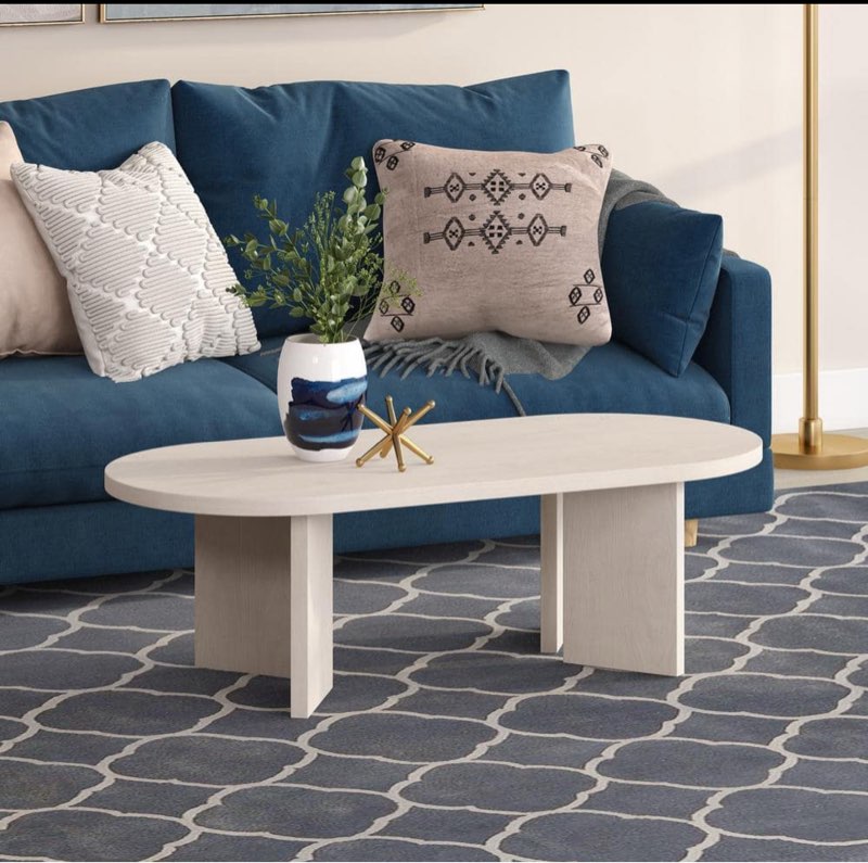 Alma 47.63 in. Alder White Oval MDF Top Coffee Table