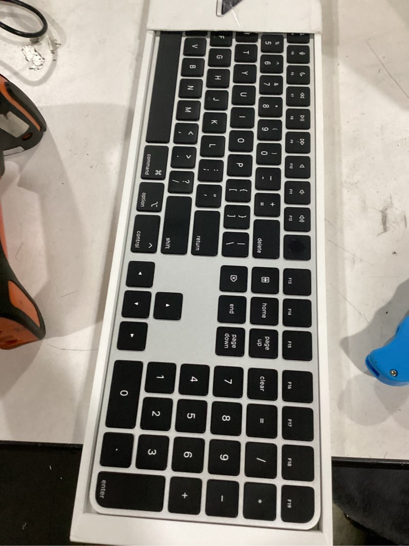 Condition photo showing As Is for Apple Magic Keyboard with Touch ID and Numeric Keypad for Mac Models with Apple Silicon - US English - Black Keys USB-C Black Keys