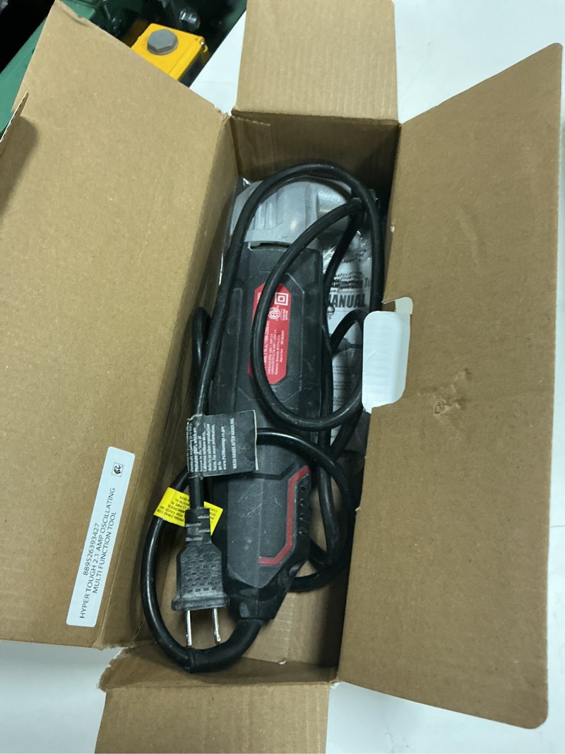 Condition photo showing As Is for hyper tough 2.1 amp new condition corded oscillating multi-function tool, variable speed, with hex key, sanding pad, quarter inch blade, scraper blade & 3 sanding sheets