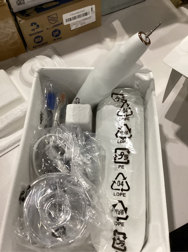 Condition photo showing New/Like New for Philips Sonicare DiamondClean Smart 9500 Electric Toothbrush, Sonic Toothbrush with App, Pressure Sensor, Brush Head Detection, 5 Brushing Modes and 3 Intensity Levels, Rosegold, Model HX9923/61 1 Count (Pack of 1) New Rose Gold