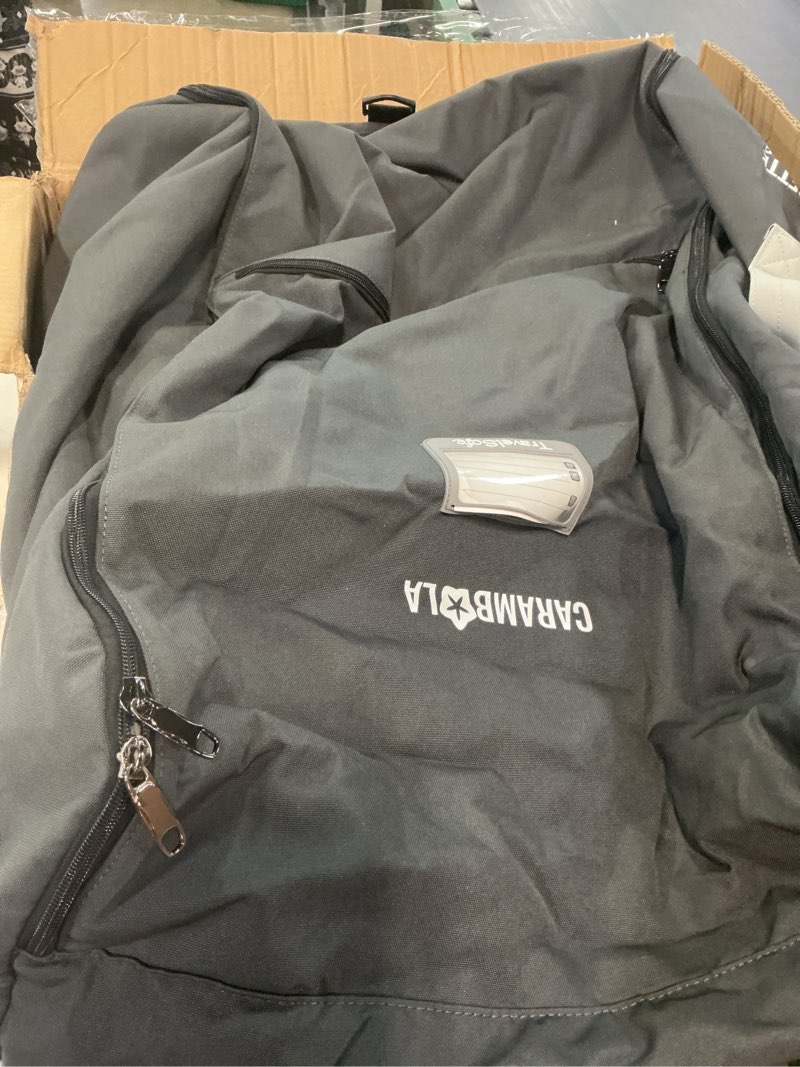 Condition photo showing Good Condition for carambola stroller bag for airplane,travel bag - compatible with uppababy vista/v1 v2 v3, cruz/v1 v2 v3 |rolling wheel bag with storage pocket, waterproof, rolling wheels, multiple handles | grey l25"×w12"×h32" single-seat stroller gray