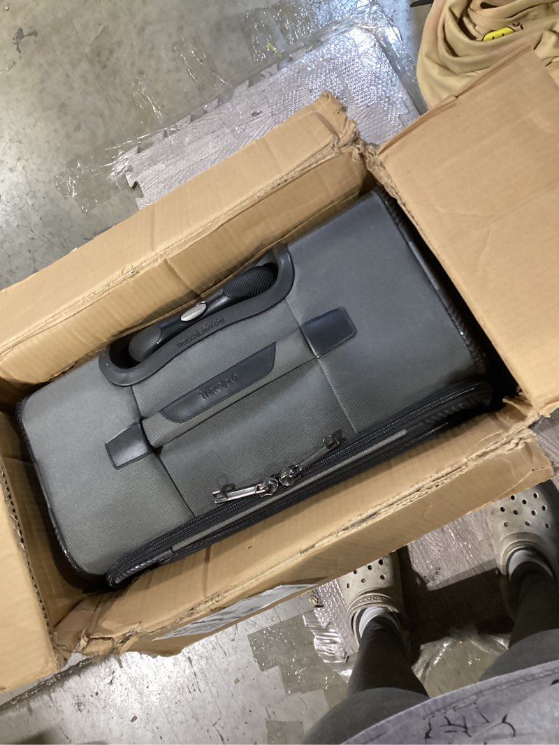 Condition photo showing Good Condition for travelpro crew classic lightweight softside expandable checked luggage, 8 wheel spinner suitcase, tsa lock, men and women, checked medium 25-inch, titanium grey titanium grey checked medium