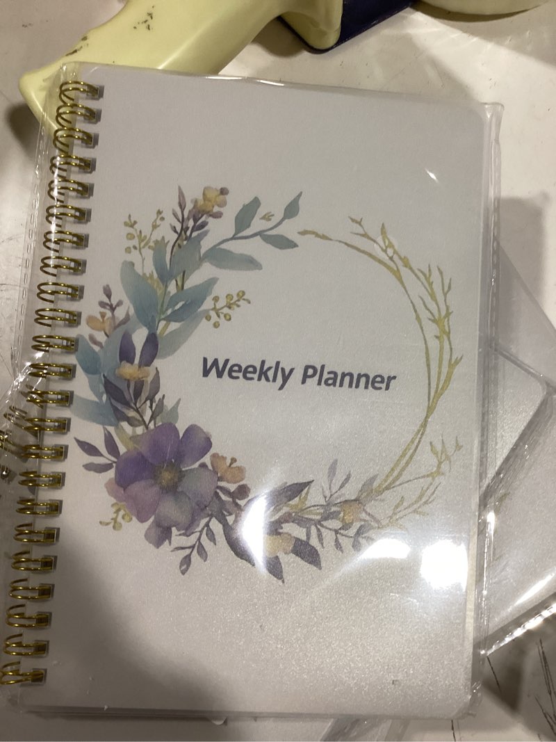 Condition photo showing Good Condition for Undated Weekly Planner- Weekly Goals Notebook, A5 To Do List Planner, Habit Tracker Journal with Spiral Binding?Flower-2? White-02