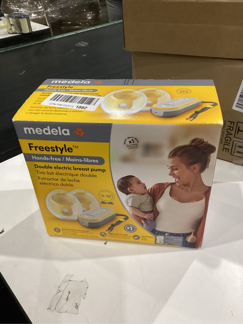 Condition photo showing New/Like New for Medela Freestyle Hands-Free Double Electric Breast Pump with Wearable Cups, App Connectivity, Portable Design Freestyle Hands-Free Breast Pump
