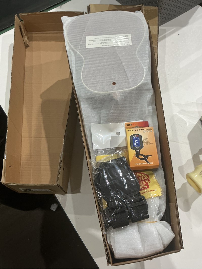 Condition photo showing New/Like New for kala ka-s satin mahogany soprano ukulele bundle with gig bag, tuner, austin bazaar instructional dvd, and polishing cloth soprano bundle w/ gig bag