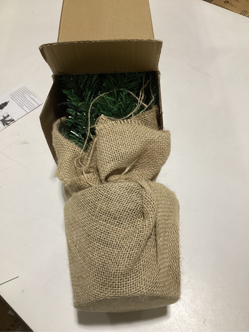 Condition photo showing Good Condition for 3ft Pre-lit Mini Christmas Tree,Artificial Pine 121 PVC Branches Tips with 11 Red Berries & 11 Pinecone & 70 LED String Lights & Burlap Wrapped Base Decor Xmas Tree for Tabletop,Battery Operated Green 3ft