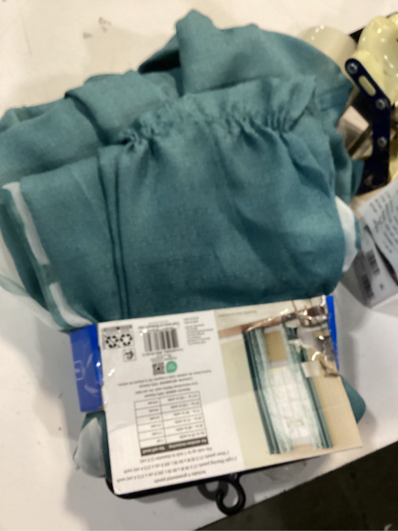 Condition photo showing As Is for mainstays kingswood solid and printed sheer grommet curtain panel set  4 piece  pacifica green  27.5  w x 84  l