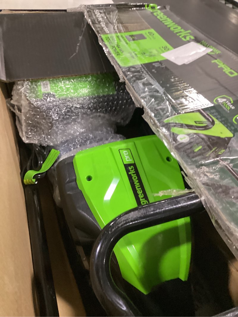 Condition photo showing As Is for greenworks pro 80v 10 inch cultivator with 2ah battery and charger, tl80l210, black and green 80v 10"(2.0ah)