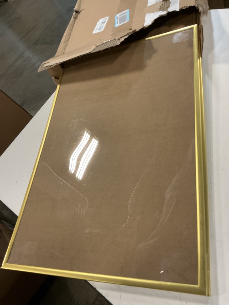 Condition photo showing Good Condition for upsimples 16x24 picture frame gold 3 pack, scratch-proof poster frames 16 x 24 for photo gallery - slide-in strips, horizontal or vertical wall mounting gold 16x24