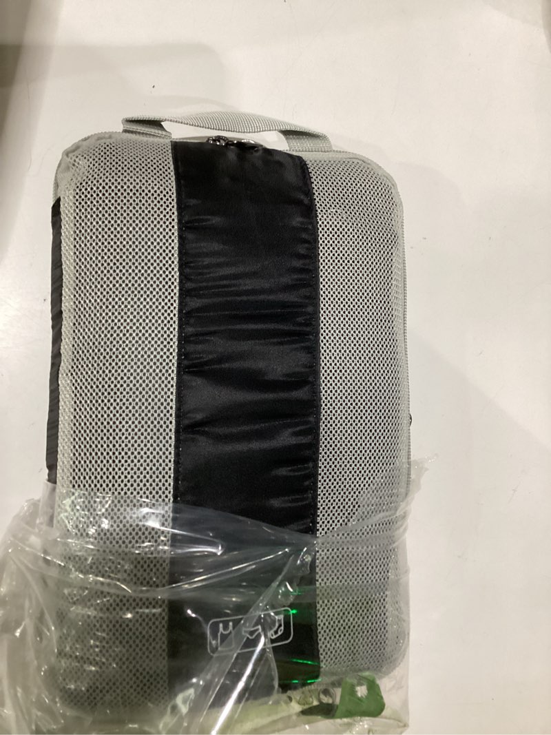 Condition photo showing As Is for olarhike 10 set compression packing cubes for travel essentials,compressible expandable space saver bags for organizing clothes,luggage suitcase garment bags with over 1000 pcs mesh holes(black) black 10 set