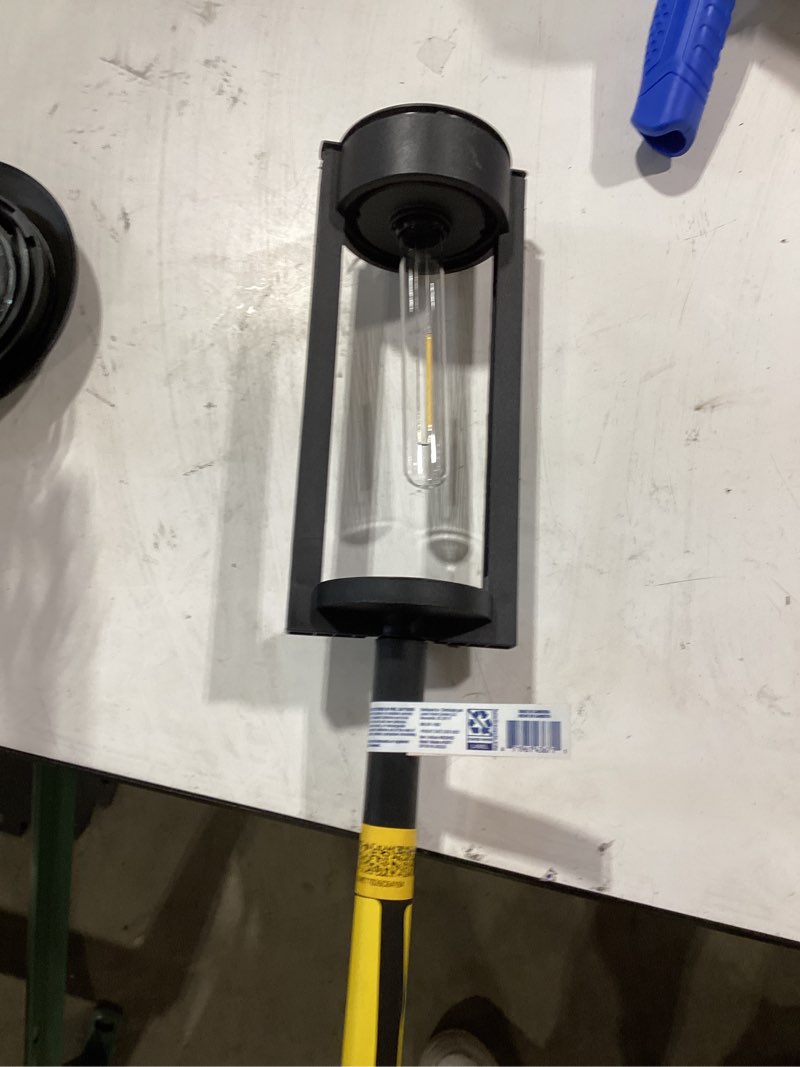 Condition photo showing As Is for harbor breeze 15 -lumens matte black solar led outdoor path light ( 3000-k ) incomplete