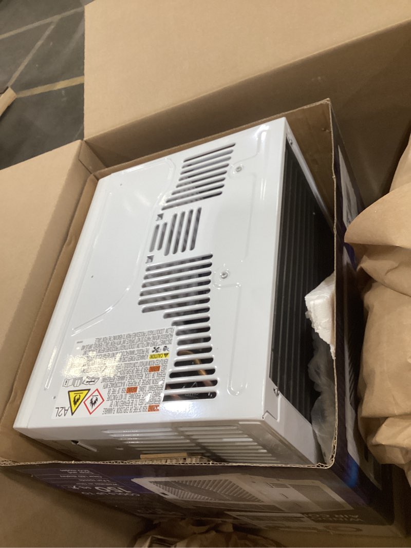 Condition photo showing As Is for comfort zone window mounted room air conditioner with remote control, 5,000 btu, digital display, 4 speed settings, 4 mode settings, 24-hour timer, sleep setting, and eco mode 5,000-btu digitial w/remote
