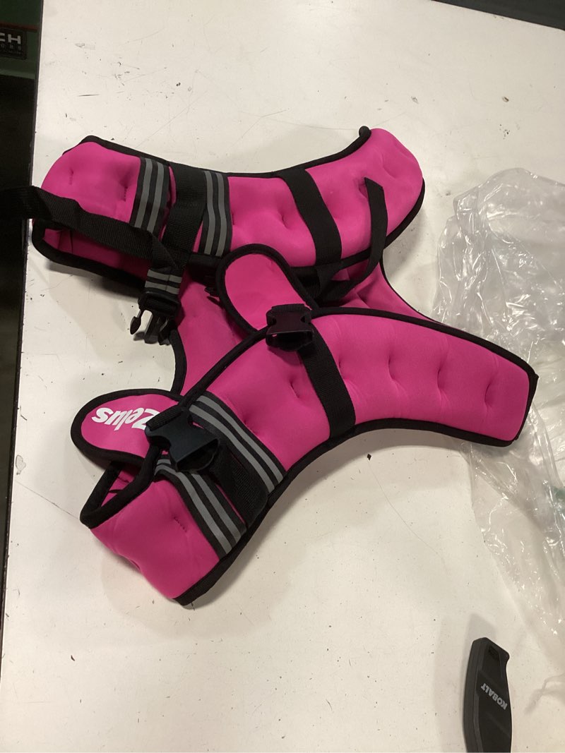Condition photo showing Good Condition for pink weight vest