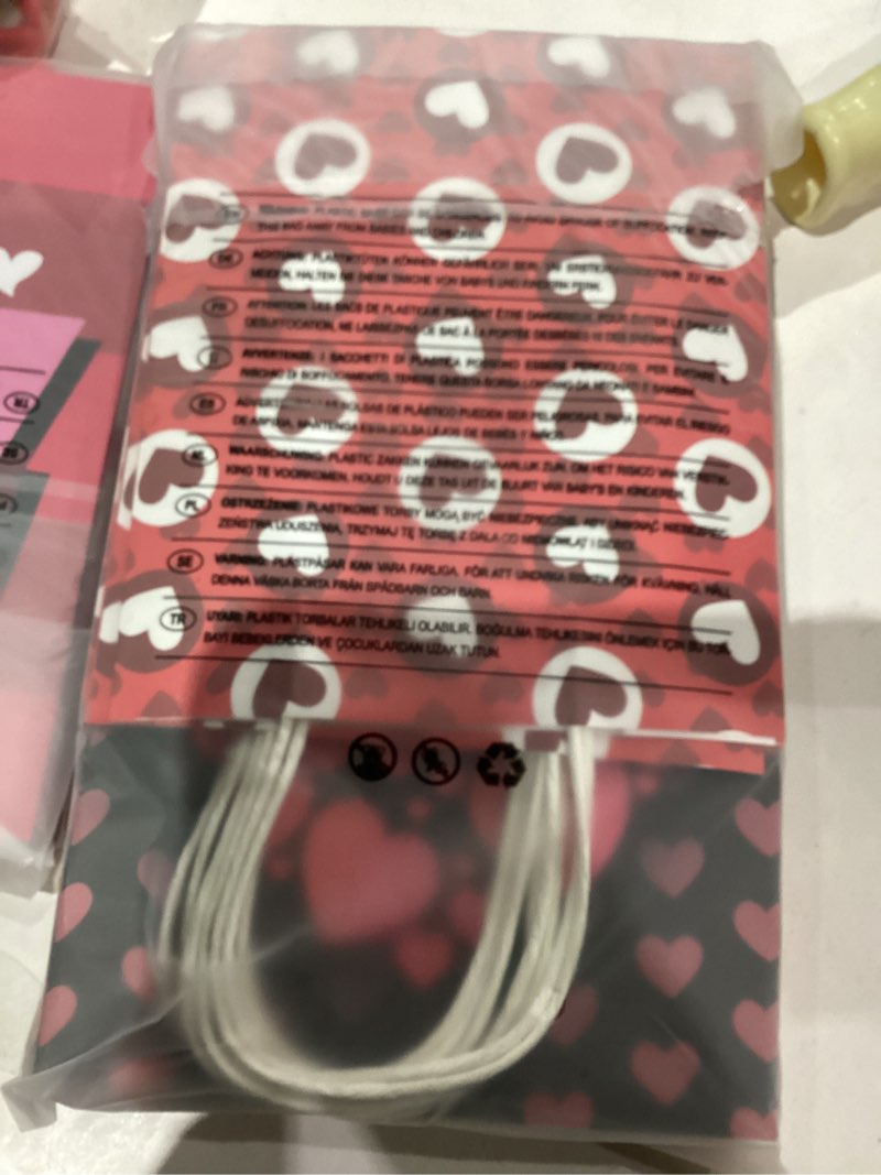 Condition photo showing New/Like New for JOYIN 24 Pcs Valentine's Day Paper Gift Bags with Handle, 9" Snack Candy Bag,Valentine Party Favors Wrapping Birthday Gift for Party Supplies Gift Giving Goodie Bags (Tissue Papers NOT Included) Red