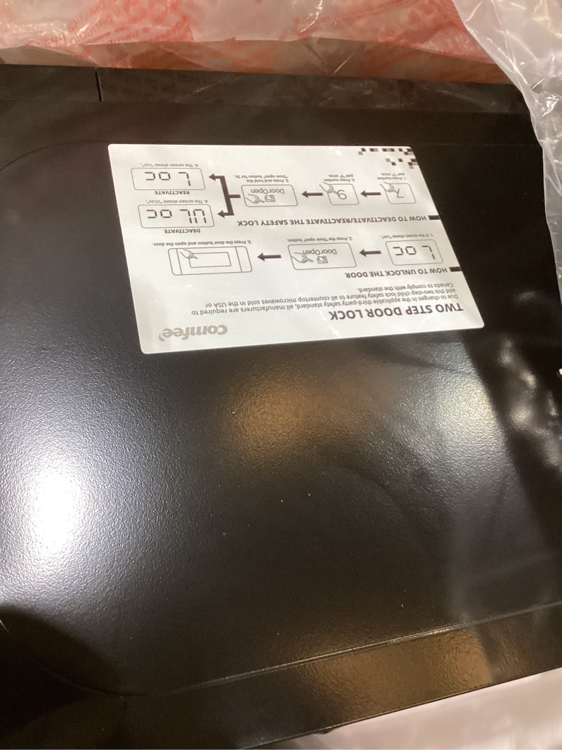 Condition photo showing New/Like New for COMFEE' EM720CPL-PMB Countertop Microwave Oven with Sound On/Off, ECO Mode and Easy One-Touch Buttons, 0.7cu.ft, 700W, Black