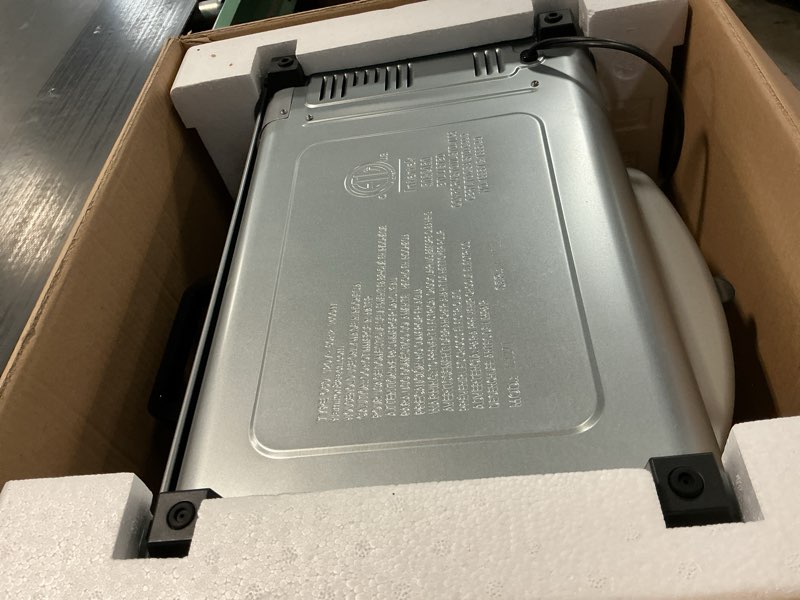 Condition photo showing As Is for Hamilton Beach 6 Slice Countertop Toaster Oven With Easy Reach Roll-Top Door, Bake, Broil & Toast Functions, Auto Shutoff, Silver (31127D)