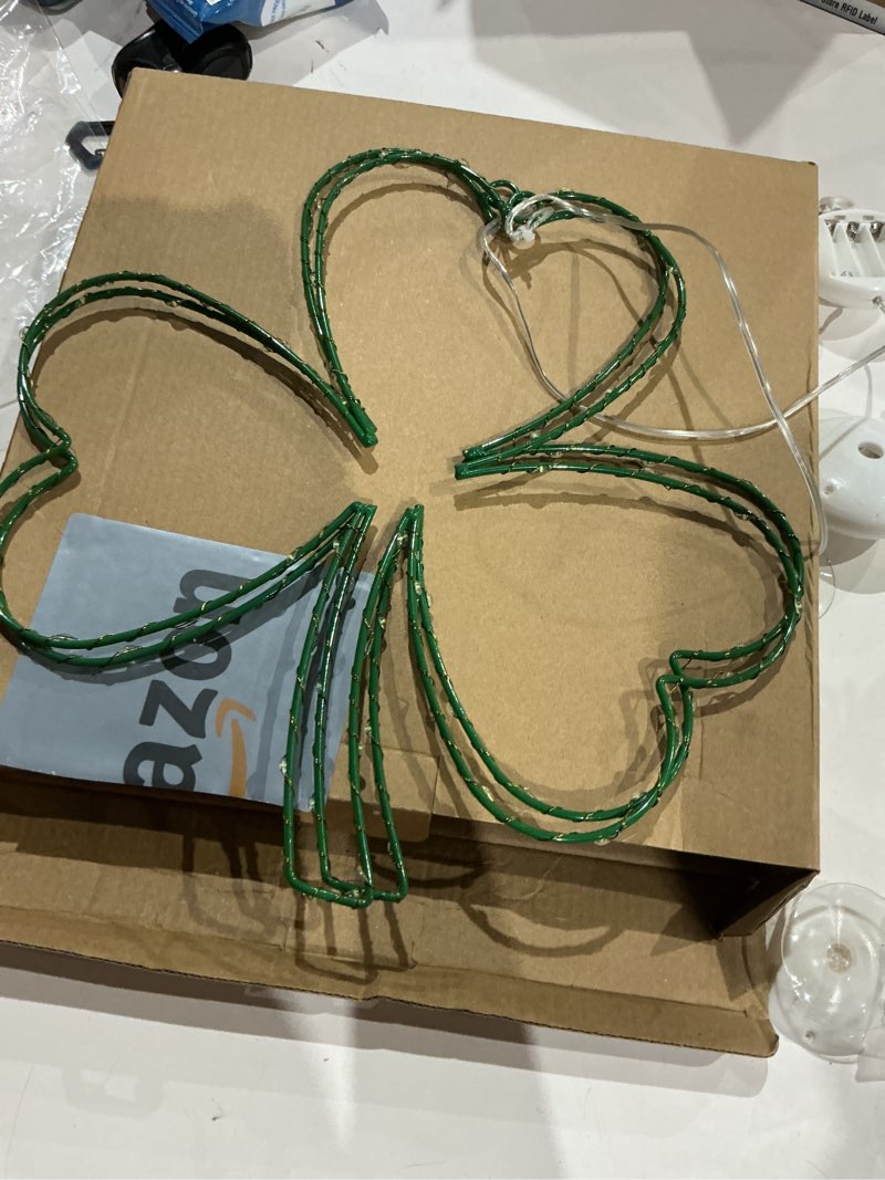 Condition photo showing As Is for day irish shamrock window silhouette