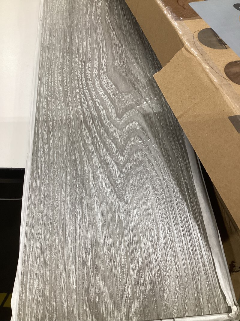 Condition photo showing As Is for art3d peel and stick floor tile vinyl wood plank 36-pack 54 sq.ft, light grey, rigid surface hard core easy diy self-adhesive flooring 36 x 6 x 0.1 inches light grey 36