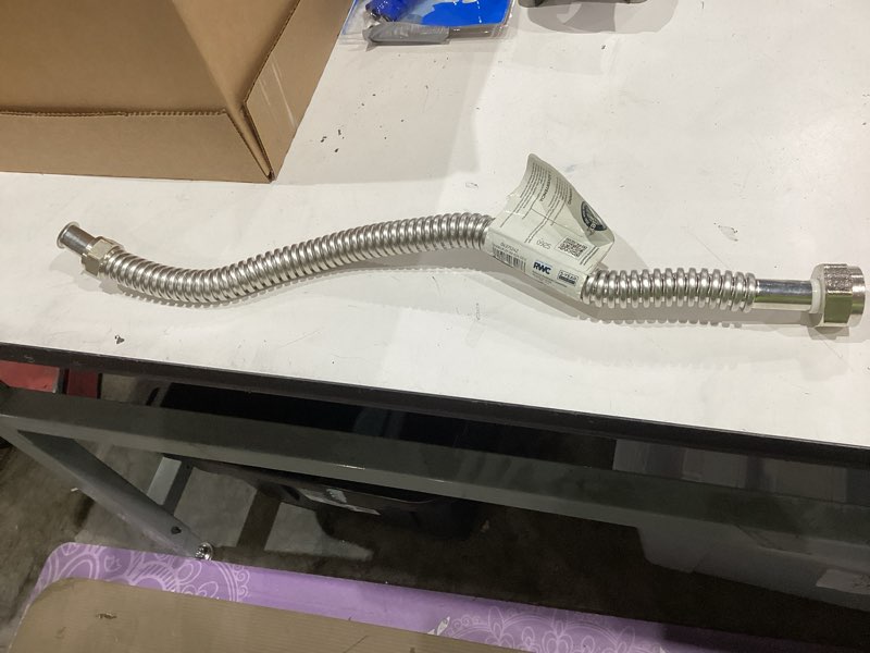 Condition photo showing Good Condition for eastman 24-in 1-in fip inlet x 3/4-in fip outlet corrugated stainless steel water softener connector