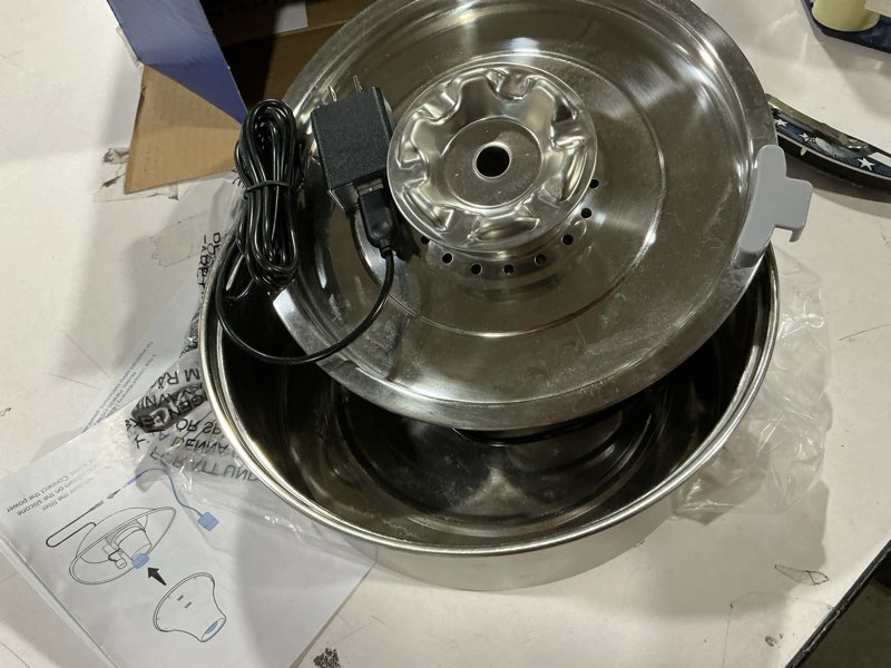 Condition photo showing As Is for PetSafe Seaside Stainless Pet Fountain - Encourages Hydration - Dual Filtration Removes Odors - Compact Design - Rust Resistant Material - Quiet Motor - 1 Count Seaside Stainless