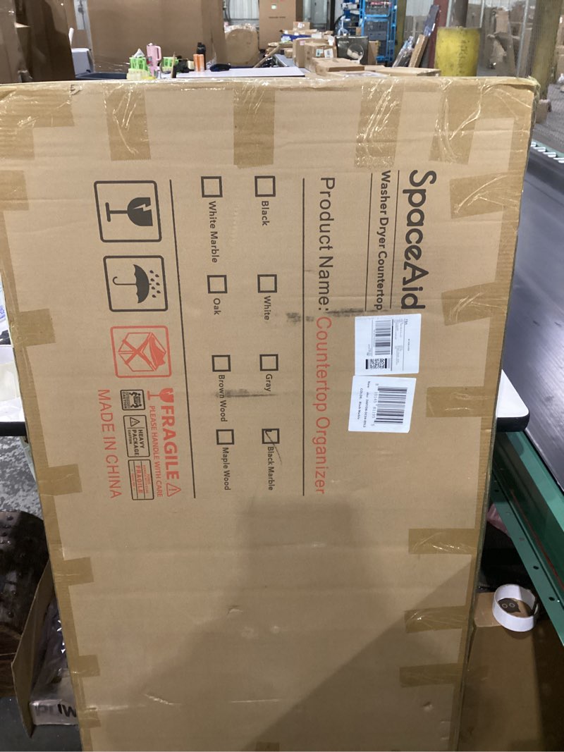 Condition photo showing New/Like New for SpaceAid Washer Dryer Countertop, Laundry Wood Shelf Topper with Edge, 54" Width x 27.5" Depth Cover Guard Organizer for Washer and Dryer Laundry Hamper Counter Storage Organization (Black Marble) Large Black Marble