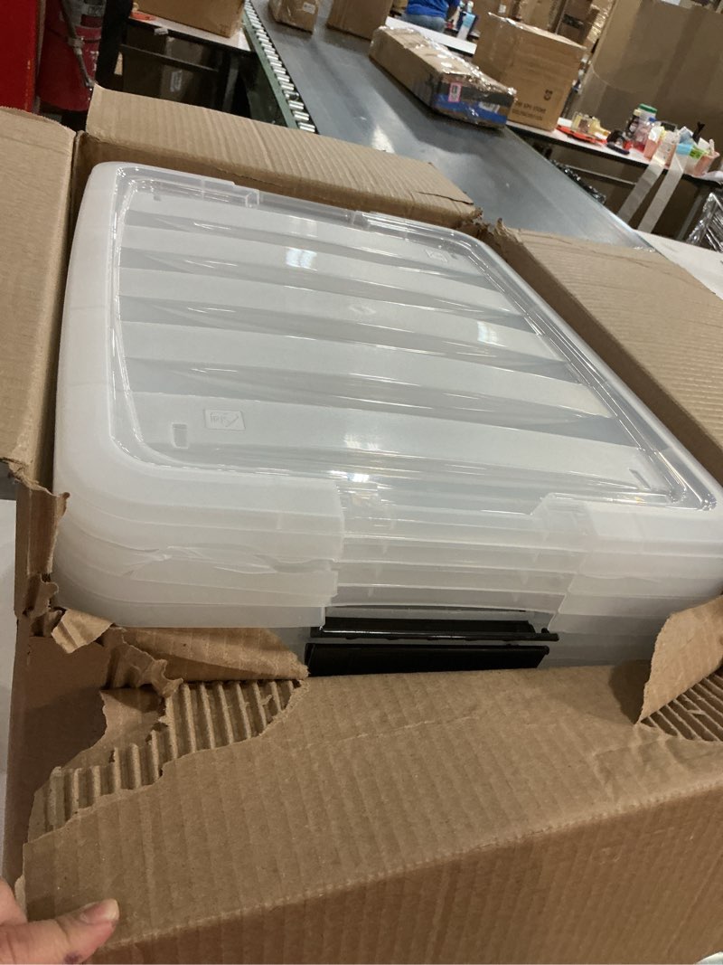 Condition photo showing As Is for IRIS USA 40 Qt Stackable Plastic Storage Bins with Lids, 4 Pack - BPA-Free, Made in USA - See-Through Organizing Solution, Latches, Durable Nestable Containers, Secure Pull Handle - Clear Clear 40 Qt 4 Pack
