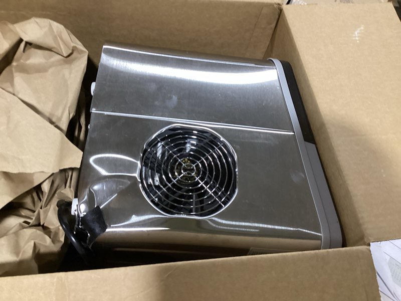 Condition photo showing As Is for frigidaire 26 lbs per day portable compact maker, ice making machine, stainless, medium