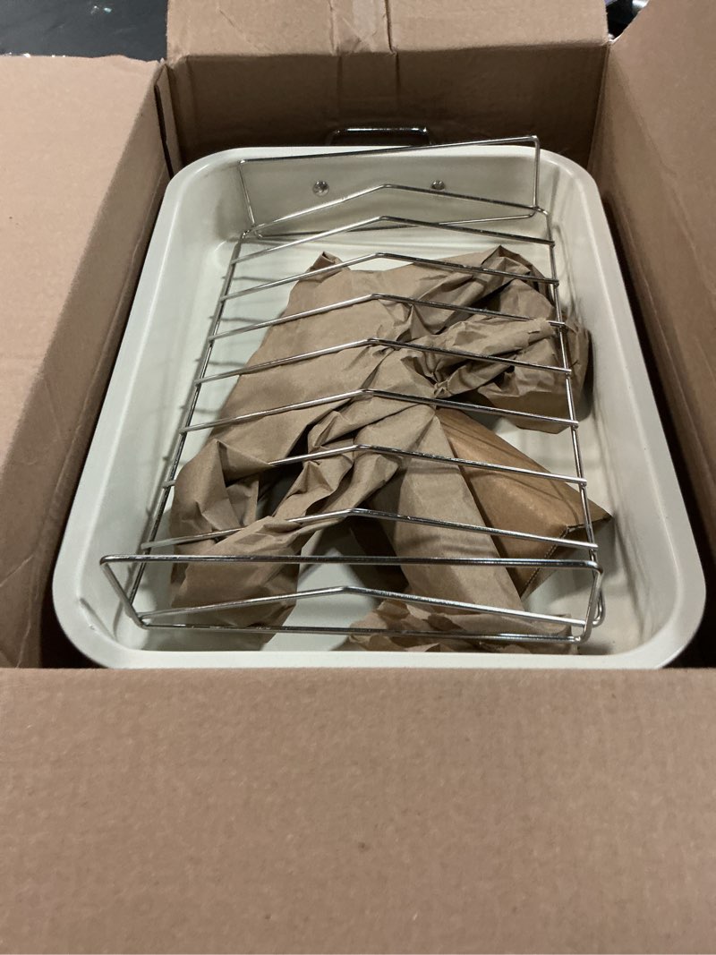 Condition photo showing Good Condition for GreenLife 16.5” x 12” Healthy Ceramic Nonstick Roasting Pan with Stainless Steel Roaster Rack, PFAS-Free, PFOA-Free, Dishwasher Safe, Oven Safe, Easy Pouring Rims, Soft Pink