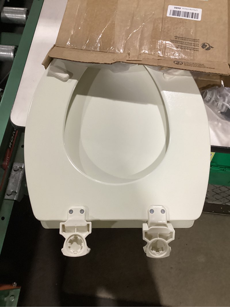 Condition photo showing Good Condition for Bemis Elongated Enameled Wood Toilet Seat in Biscuit with Easy•Clean? Hinge